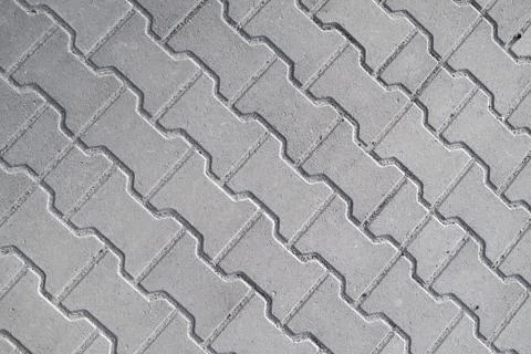 Brick pavement tile, top view. Urban texture as background. Stock Photos