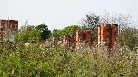 Brick pillars, the remains of the building Stock Footage 117111650