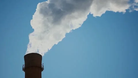 Brick Production Pipe with White Smoke against A Bright Blue Sky. Stock Footage 153325416