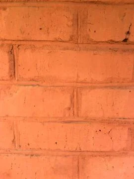 Brick red old wall. Bricks pattern. Close-up. Stock Photos