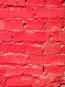 Brick red painted wall close up texture Stock Photos