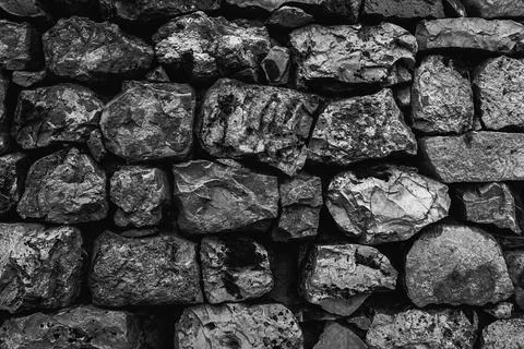 Brick Silver Wall. Grunge Rough structure. Abstract texture. Rock background. Stock Photos