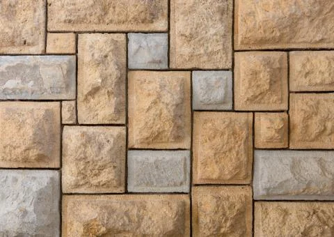 Brick stone wall with rough texture Stock Photos