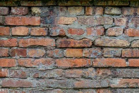 Brick stonework with plaster and cement background Stock Photos
