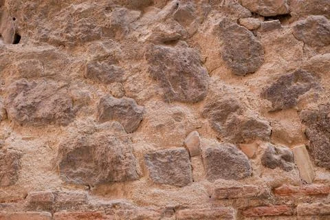 Brick texture old vintage background. Dirty aged and rust stone surface facade. Stock Photos