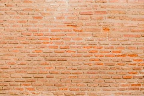 Brick texture old vintage background. Dirty aged and rust stone surface facade. Stock Photos
