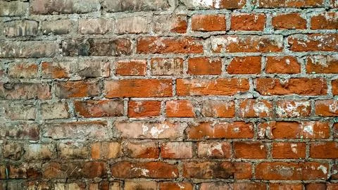 Brick texture with plaster Stock Photos