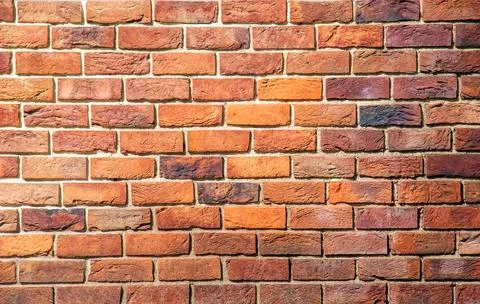 Brick tile wall abstract background. Exterior view of a house made of block.. Stock Photos