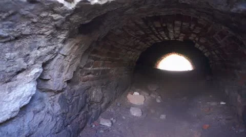 Brick Tunnel with Light at the End Stock Footage 12423536