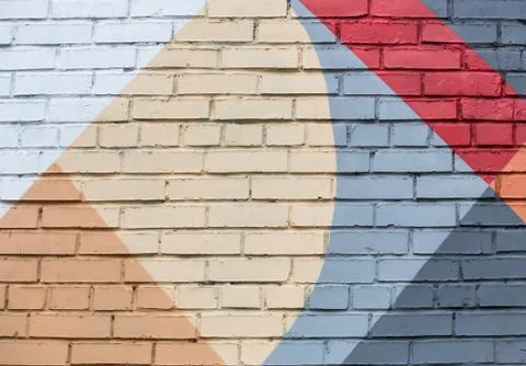 Brick wall with an abstract geometric pattern Stock Photos