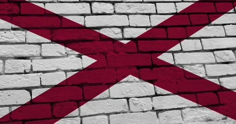 A brick wall with The Alabama state flag of the United States of America Stock Footage 337426864
