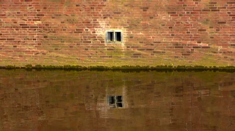 Brick wall and current river water in  sunlight Stock Footage 39711835