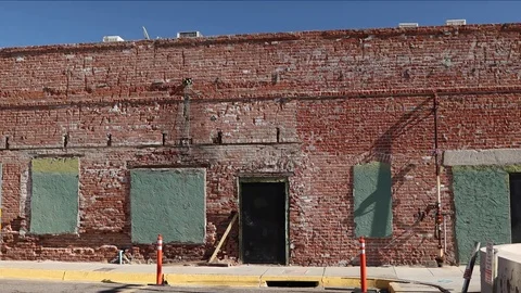 Brick Wall and Historic Building. Stock Footage 84876797