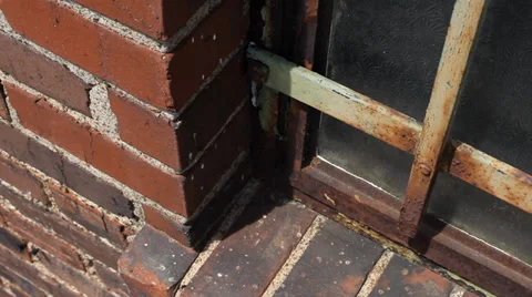 Brick Wall and Iron Bars Stock Footage 33755243