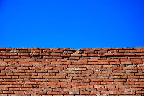 Brick wall and sky Stock Photos