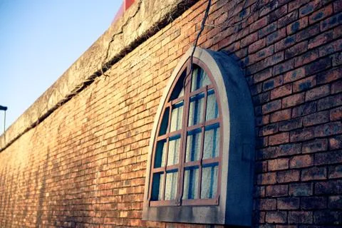 Brick wall and window 库存照片