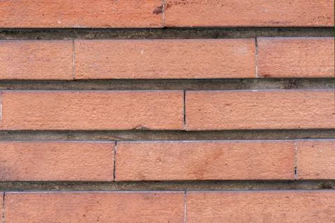 Brick wall background. Aged brick walling for texture and design background. Stock Photos