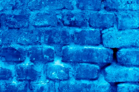 Brick wall background. Aged sand stone walling for texture and design backgro Stock Photos