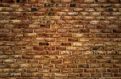 Brick wall background. Brickwall for texture or backdrop. Brick on building wall Stock Photos