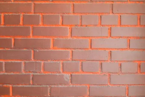 Brick wall background. Bright brown-orange. Foto stock