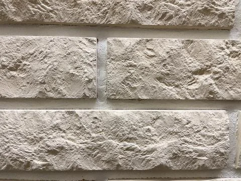 Brick wall background, close-up. Beautiful wallpaper. Stock Photos