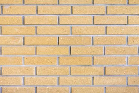 Brick wall background close-up. Stock Photos