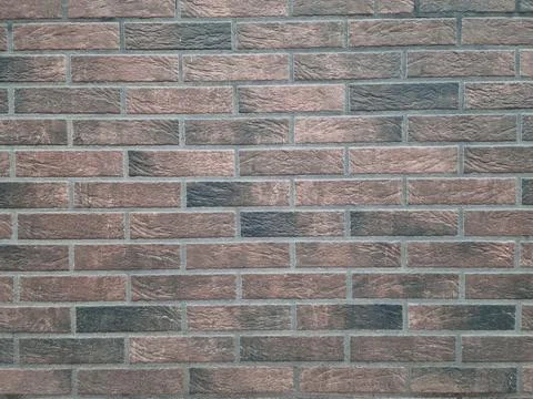 Brick wall background, red and black bricks, wall facing, decorative brick .. Stock Photos