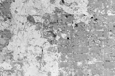 Brick wall background, texture. Wall fragment with stains of old paint Stock Photos