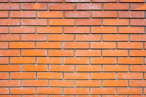 Brick wall background. Wall of red flat brick Stock Photos