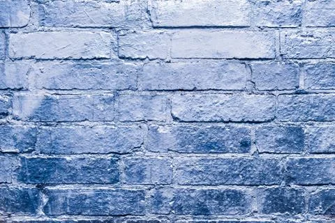 Brick  wall  with blue, silver colored paint Stock Photos