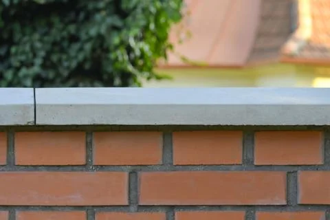 Brick wall. Brick base. Brick background. Concept of construction and building Stock-Fotos