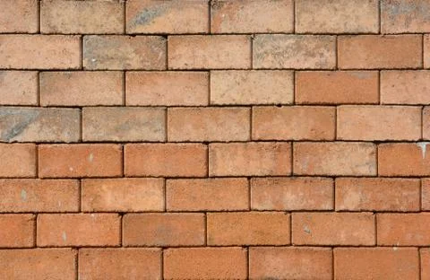 Brick wall , Brick is a popular medium for constructing buildings Stock Photos