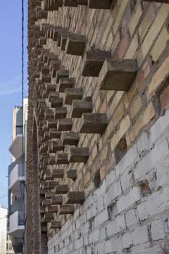 Brick wall with brick steps Photos