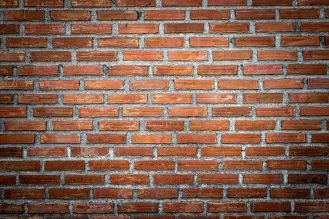Brick wall, brick texture surface, red brick pattern background with dark vig 写真素材