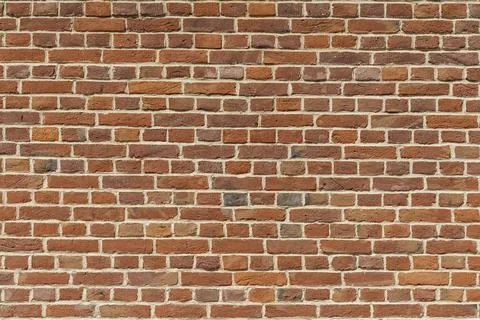 Brick wall. Brickwork from an old brick in a rustic style. Structure and pattern Stock Photos