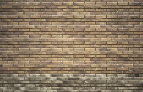 Brick wall. Brown brick background with gray border Stock Photos