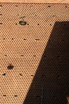 Brick wall.  Brown brick wall texture on the facade of a building.  . Foto stock