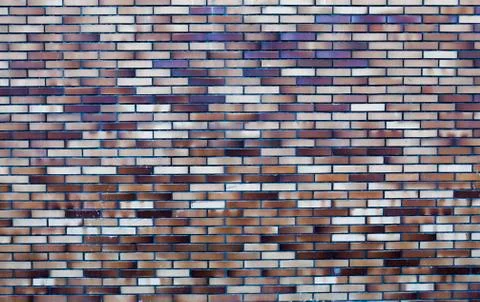 Brick wall, building facade surface as urban background Stock Photos