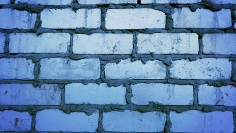 Brick wall closeup with blue lighting Video stock 261762266