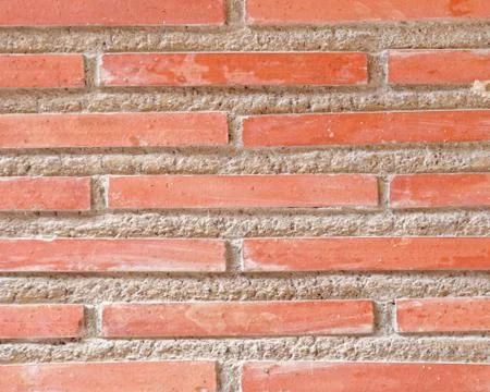 Brick wall closeup, seamless pattern background Stock Photos