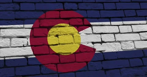 A brick wall with the colorado state flag of the United States of America Stock Footage 337428049