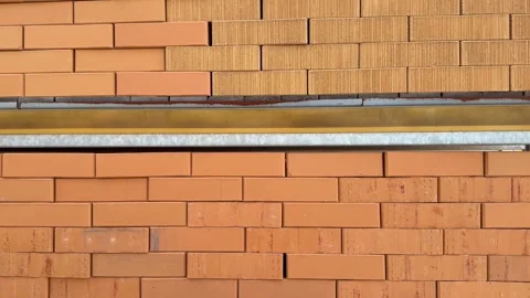 Brick wall construction showing seismic resistance test Stock Footage 314131835