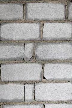 Brick wall in construction texture Stock Photos