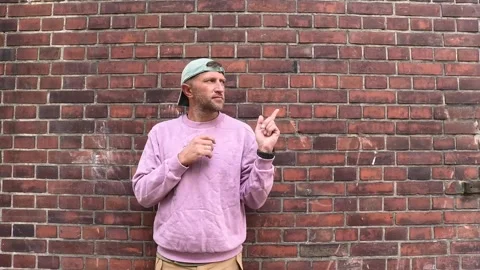 Brick Wall Conversations: Speaking and Gesturing Stock Footage 252817633