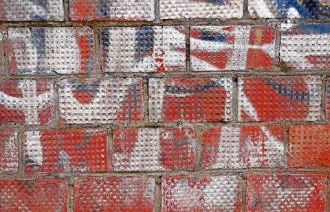 Brick wall covered in paint as an abstract background Photos