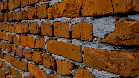 Brick wall with crack, wall background, texture. The concept of the old house Stock Photos
