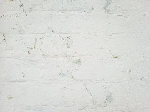Brick wall with crumbling plaster Foto stock