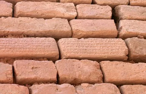 Brick wall with cuneiform writing on bricks, shush, iran Stock Photos