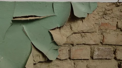 Brick wall - detail. Brick wall made of red bricks with old fallen plaster. Stock Footage 221168624