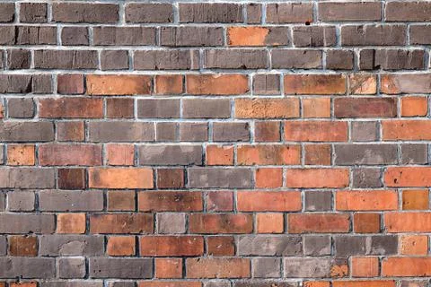Brick wall with different shades of red Foto stock